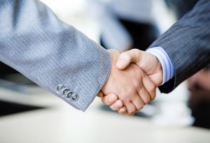 Handshake of businesspeople