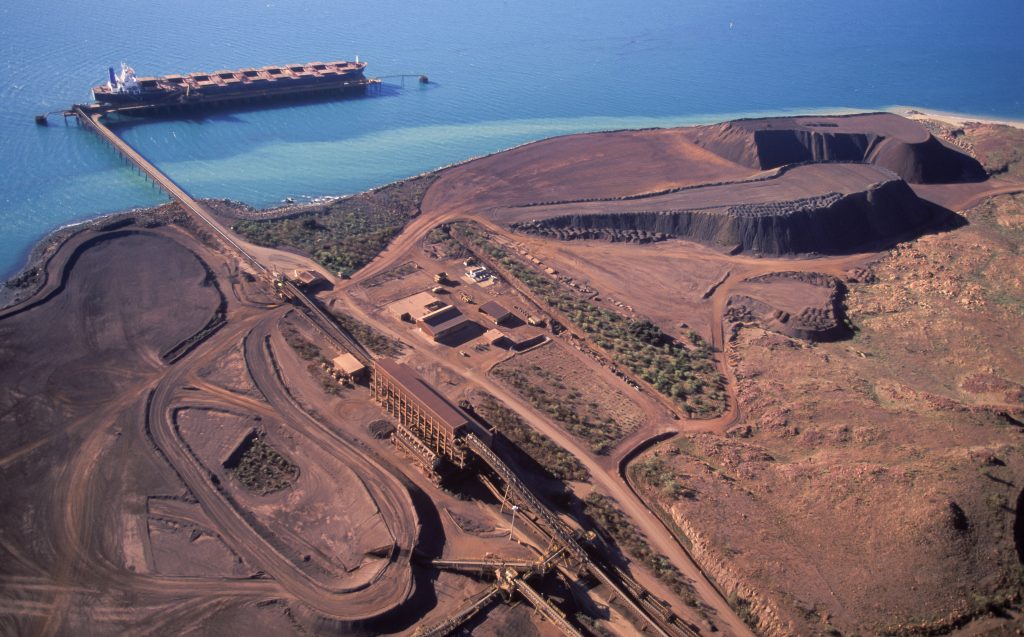 Mining iron oreLoading iron Ore on a ship at Dampier Western Australia