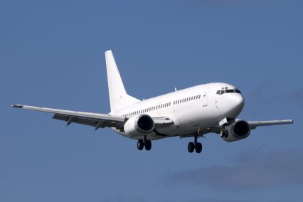 Airplane Boeing 737 in flight Sky