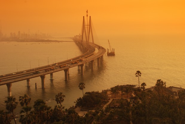 Top angle view of Bandra-Worli Sea Link, Mumbai at dusk alongside Arabian sea. Copy space